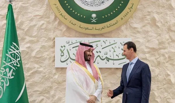 Saudi Arabian Crown Prince Mohammed bin Salman greets the head of Syrian regime Bashar Al Assad, ahead of the 32nd Arab League Summit in Jeddah, Saudi Arabia, on May 19, 2023. (Bandar Aljaloud/ Royal Court of Saudi Arabia/Anadolu Agency)
