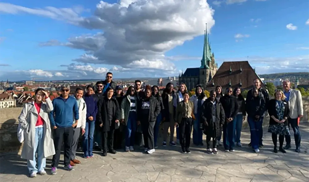 group picture of Brandt School students in front of the dome