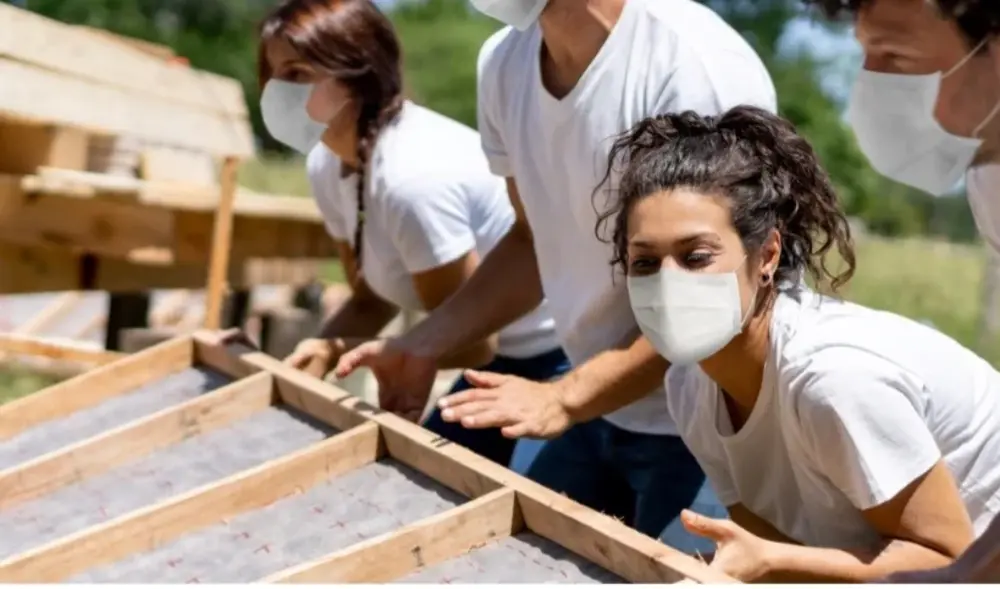 Volunteers building