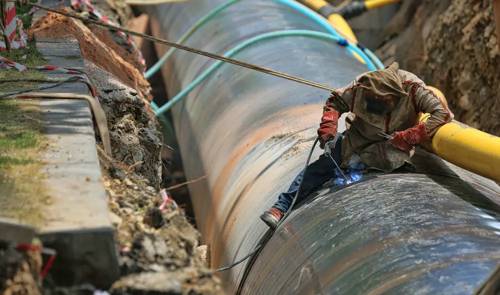 Man working on a pipeline
